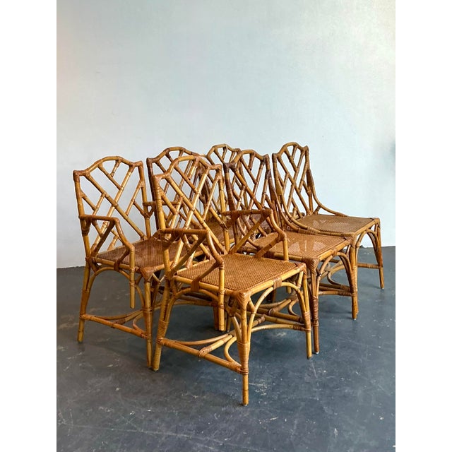 This exquisite set of six vintage dining chairs is a masterclass in Hollywood Regency glamour, featuring the timeless...