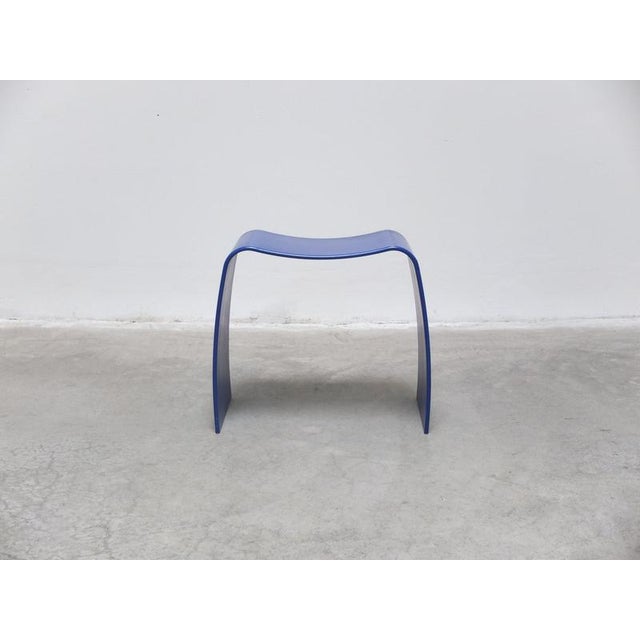 Ash blue lacquered Askman M Taburet (stool) designed by Jørgen Møller. A beautiful combination of organic comfort and...
