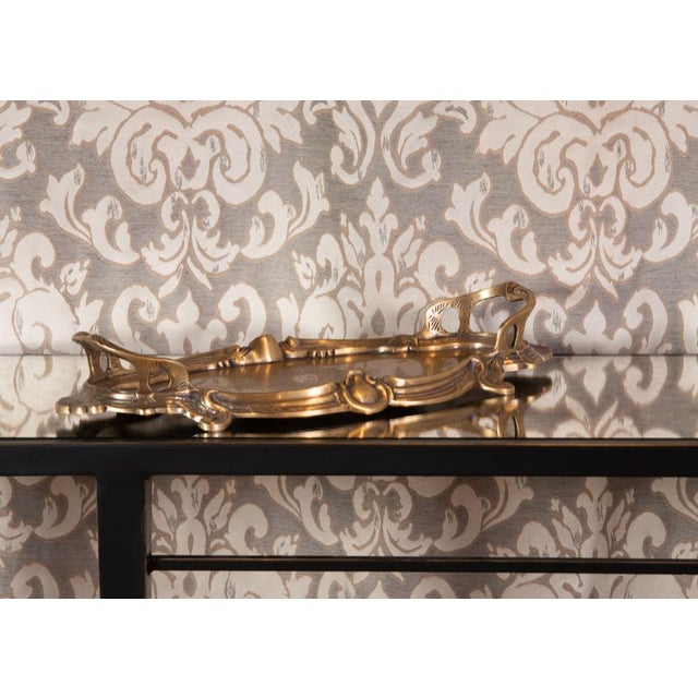 Inspired by the rococo style, our gallery tray features details such as the embossed floral pattern in the center and the...