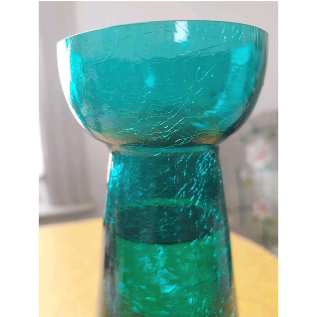 Here's a stellar example of a hyacinth vase from the Victorian period. It's a vibrant shade of aquamarine and the glass is...