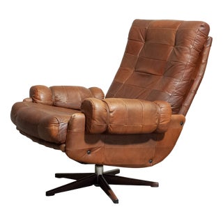 Rocking and Swivel Lounge Chair attributed to Arne Norell for Arne Norell AB, 1960s For Sale