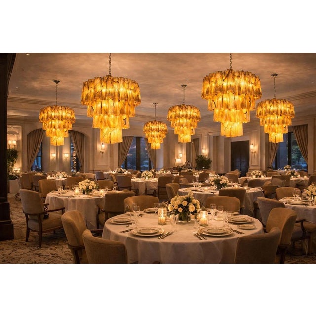 Italian chandelier in Murano glass and nickel plated metal structure on 4 levels. The armor polished nickel supports 80...