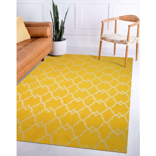 Xena Timeless Yellow Hand Knotted Rug, Country of Origin: India. This exceptional piece showcases the meticulous skill...