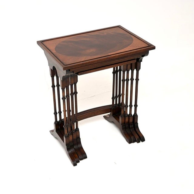 A smart and very useful antique Georgian style nest of four tables. They were made in England, they date from around the...