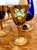 This exquisite liqueur set, featuring a decanter and five glasses, was handcrafted in Venice by renowned glass artists...