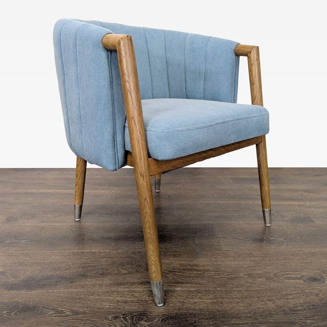 Add comfort and style to your space with this Moe's lounge chair. It features a light blue upholstered seat and back with...
