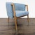 Add comfort and style to your space with this Moe's lounge chair. It features a light blue upholstered seat and back with...