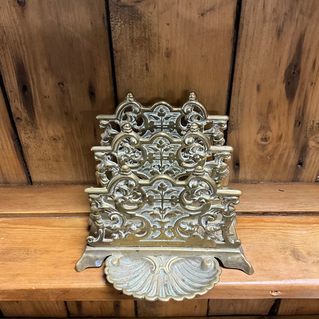 Keep correspondence beautifully organized with this stunning antique English brass letter rack. Featuring two compartments...