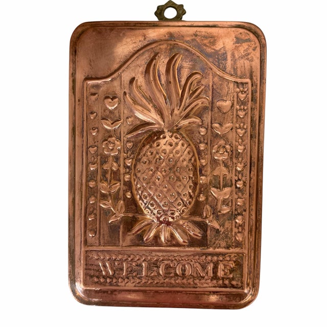 Vintage copper pineapple food mold. Measures 7” w x 1” d x 11.5” h. Minor tarnish