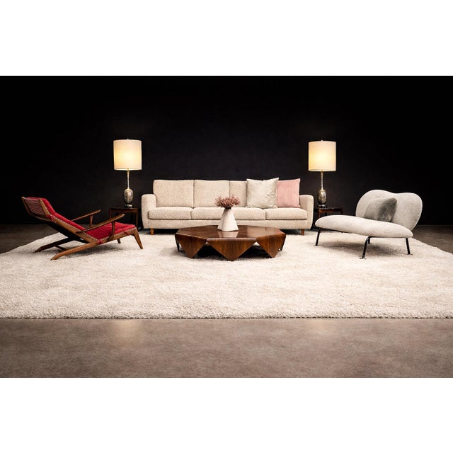Produced in Brazil during the 1950s by Freijó Móveis, this sculptural loveseat reflects the rise of organic modernism in...