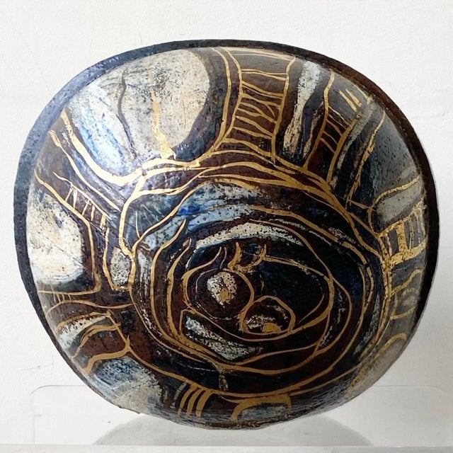 Incredible mid Century Modern danish pottery vase. Features a brown and gold coated finish.