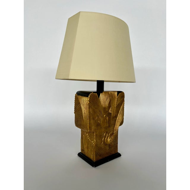 Presenting a rare and exquisite Art Deco table lamp, designed by the renowned Chapman, featuring a unique pattern and a...