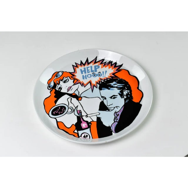 Pair of glazed ceramic plates by Franco Pozzi, Italy, dated 1965. Bold graphic decoration with a comic-strip sensibility...