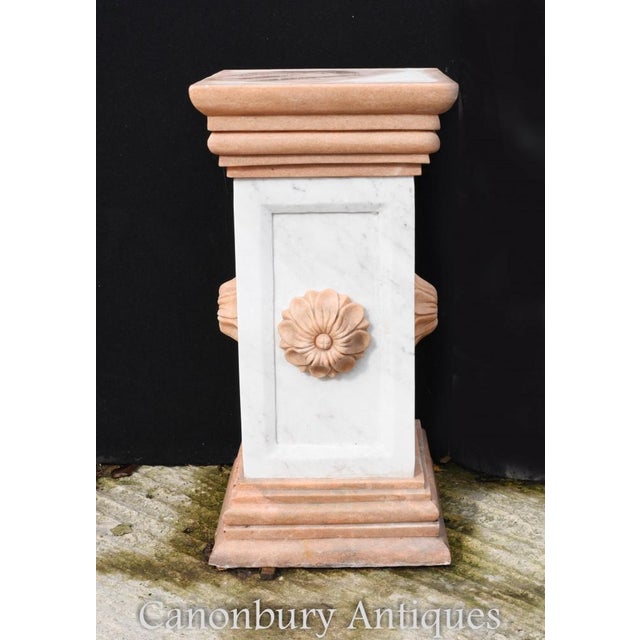 Gorgeous pair of Italian marble pedestal column tables. Great for displaying decorative pieces such as busts or vases....