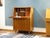 Stylish secretary desk from the late 1960s. The piece shows signs of age and use. It has been cleaned, and minor...