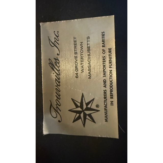 Exceptional set of eight vintage dining chairs by Trauvailles Inc., dating to the 1970s. This set showcases refined...