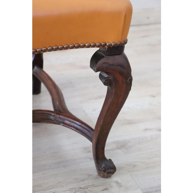 Antique armchair dating back to the end of the 19th century, with a design inspired by the Louis XIV period. The armchair...