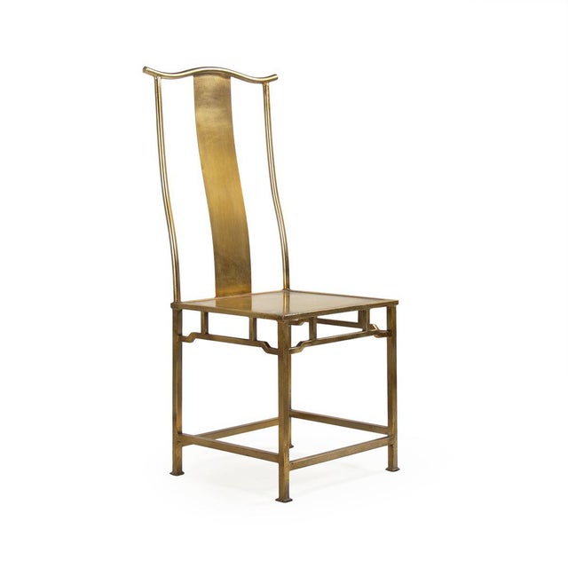Iron side chair in antique gold finish.