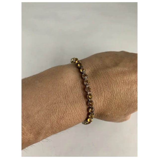 This beautiful Art Deco sterling and citrine paste line bracelet is perfect for every day. It goes with everything! It...