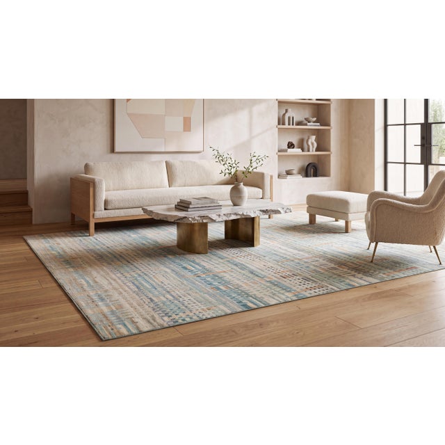 Elevate your space with this exquisite contemporary hand-woven wool rug, featuring a sophisticated, architectural plaid...