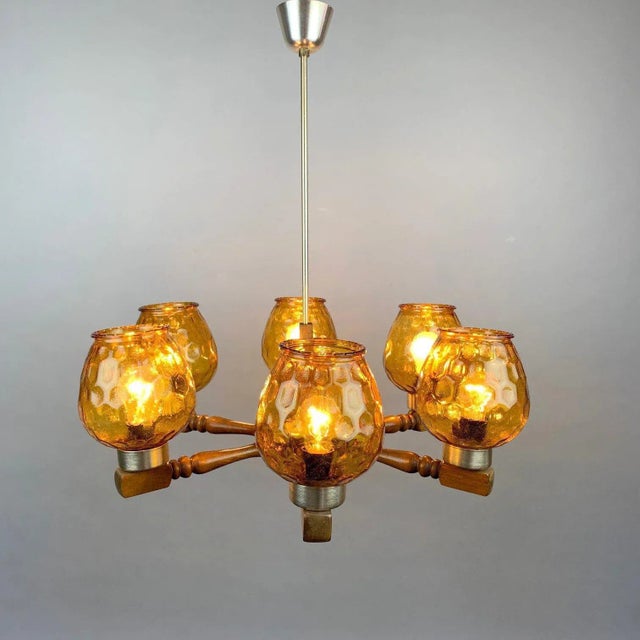 Vintage six-arm wooden chandelier from the 1970's. Made in former Czechoslovakia. Original wiring, fully functional....