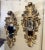 This impressive pair of antique Italian Louis XV style wall mirrors features elaborate Rococo carvings and a rich gold...