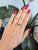 A sleek black onyx anchors this solid 10K yellow gold estate ring, accented by a single earth-mined diamond. Onyx, a black...