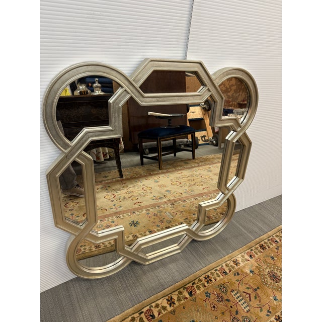 Design Plus Gallery presents the Salon Wall Mirror with Decorative Shaped Border by Bernhardt. This mirror provides an...
