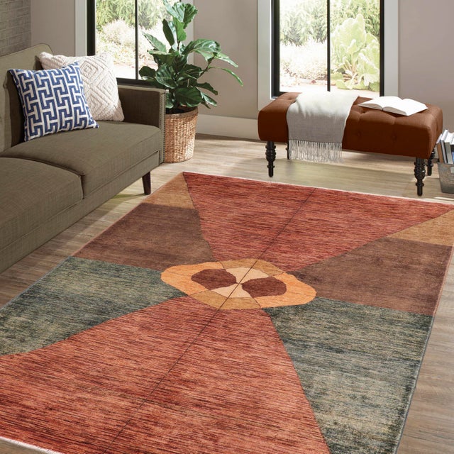 Transform your home's interior with a stunning hand-knotted Gabbeh rug. These rugs are meticulously crafted with bold...