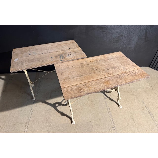 A hard to find, pair of Bistro Tables, French in origin and dating to the later part of the 19th Century. Lots of...