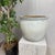 "About This Piece About This Piece Softly washed in hues of ash white and pale gray, this crackle-glazed ceramic planter...