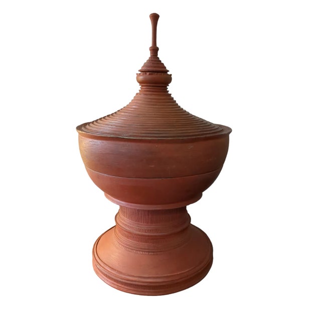 This is an antique Burmese offering vessel or urn with a matching pedestal, which is rare to find. The gorgeous red...