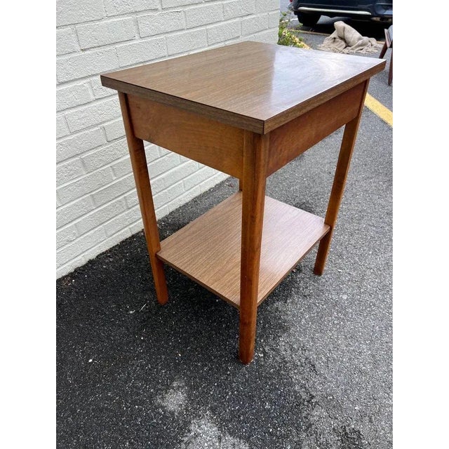 Mid Century Modern 2 Tier Side Table 2 tier, formica top Sturdy Approximate measures: 27'' tall , 15 3/4' deep, 20' wide