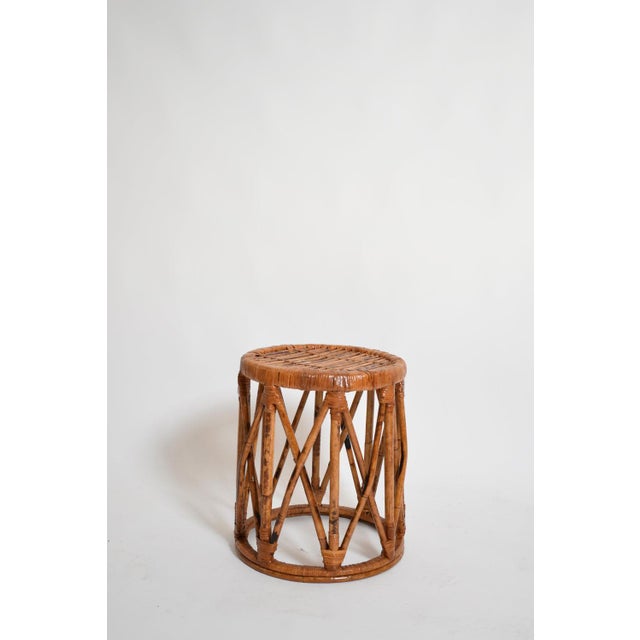 Pair of rattan cylindrical stools, 1960s. Height: 43 cm - 16.93 in Diameter: 30 cm - 11.81 in