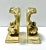 A decorative pair of vintage gold gilt shell bookends with Neoclassical and Rococo-style detailing. The sculptural shell...