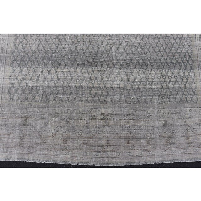 Early 20th Century Distressed Persian Antique Tabriz Carpet With Muted Floral Design in Light Gray 8'0 X 11'2 For Sale - Image 5 of 11