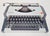White Vintage Traveller De Luxe Typewriter with Case from Olympia, 1970s For Sale - Image 8 of 10