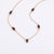 Enhance your jewelry collection with this sophisticated station necklace. Designed to offer a refined and polished...