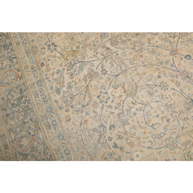 An early 20th-century all over Formal design Persian oversize kerman carpet Measures: 11'9'' x 16'10''.