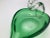 A sweet vintage decorative green and clear glass bird. The glass bird in really good condition, with a minor chip on the...