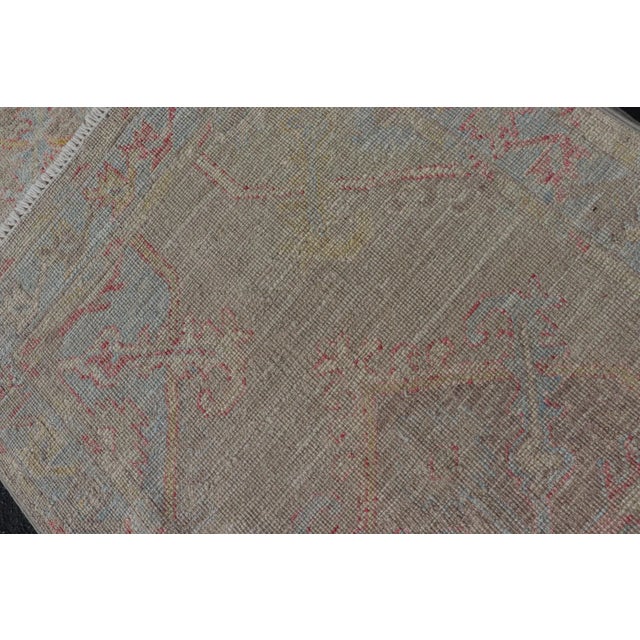 Hand-Knotted Oushak Runner With Medallion Design on a Tan Field With Red & Blue For Sale - Image 12 of 13