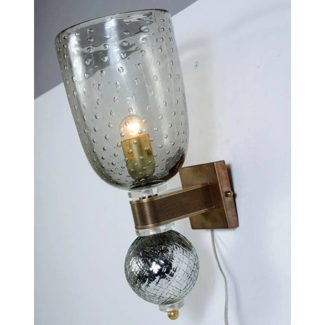 This pair of sconces in the style of Cenedese is made of Murano glass with mercury glass bowls. Up to 250V (Europe/UK...