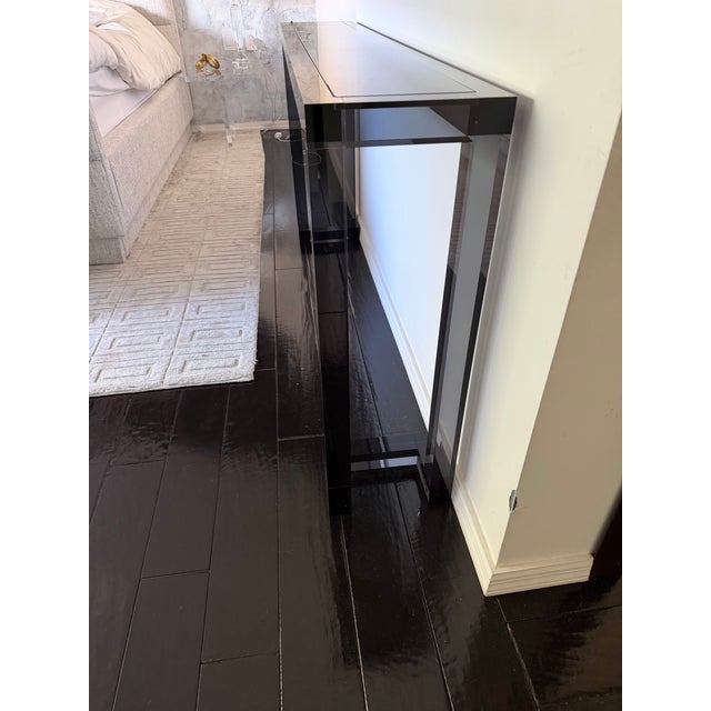 Brand new, not in the box, Ava sofa table in black acrylic and glass.