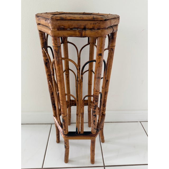 Vintage 1970s handcrafted tortoise shell plant stand or can be used as a drinks table. Handcrafted in the Philippines.