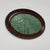 Italian modern picture with wooden frame and formica, 1940-1980s Framed piece with a decorative dark wood oval frame....