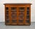 Make a statement with this striking mid-century modern display cabinet by Young Manufacturing Company, a beautifully...