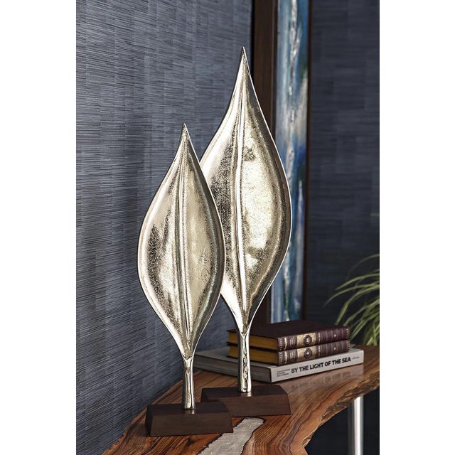 Pair of Tall Contemporary Decorative Polished Silver Metal Leaf Sculptures Pair of modernist abstract leaf decorative...