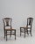 Exemplifying the refined restraint of the Georgian aesthetic, this distinguished pair of accent chairs from 19th-century...