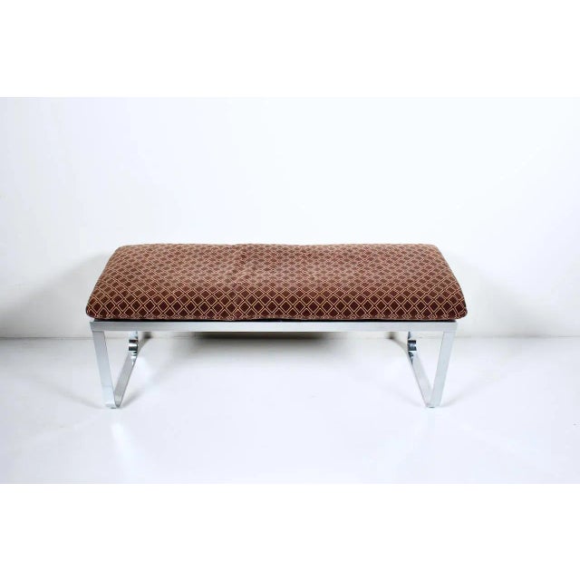 Design Institute of America International style cushioned Chrome Bench. Featuring a clean, reflective Chrome rectangular...