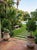 Pair of Vintage Faux-Stone Chipped Resin Garden Planters For Sale In West Palm - Image 6 of 12